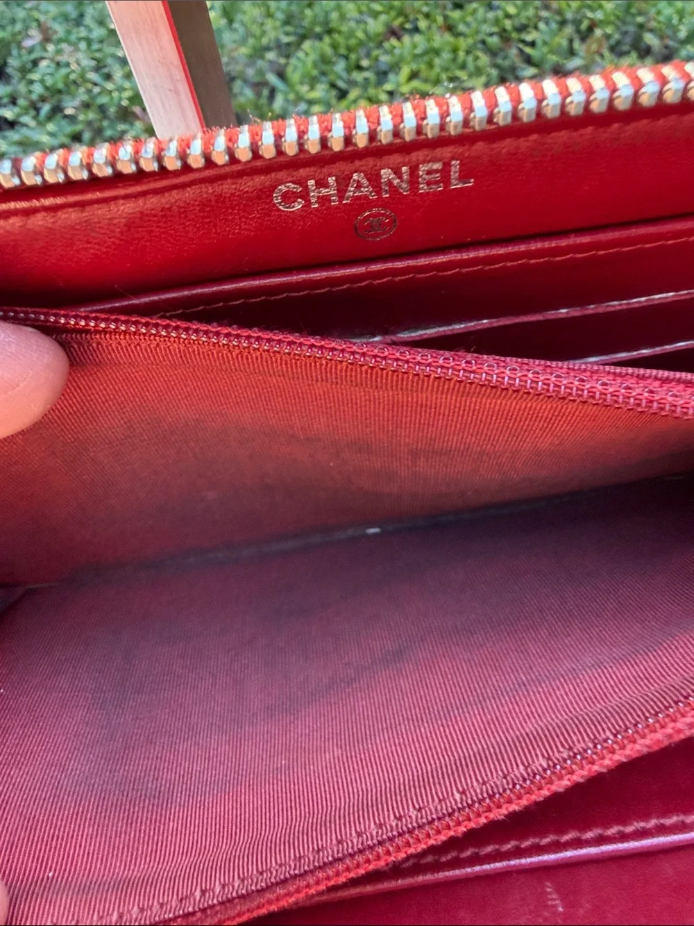 CHANEL Authenticated Quilted Caviar Leather Zip-Around Wallet in Burgundy/red